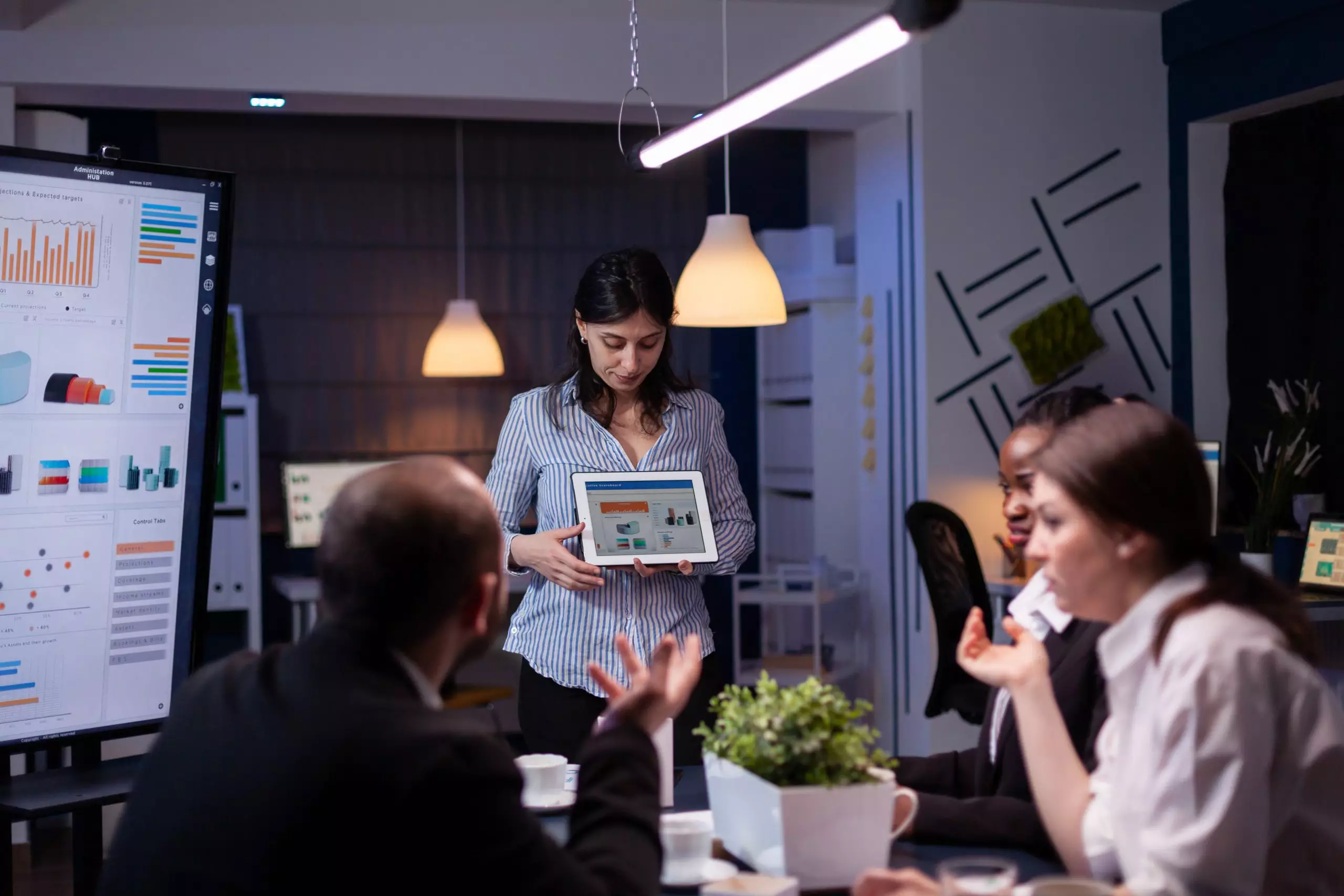 Overworked workaholic entrepreneur woman shwoing marketing graphs using tablet ISGA | Valeurs et engagements